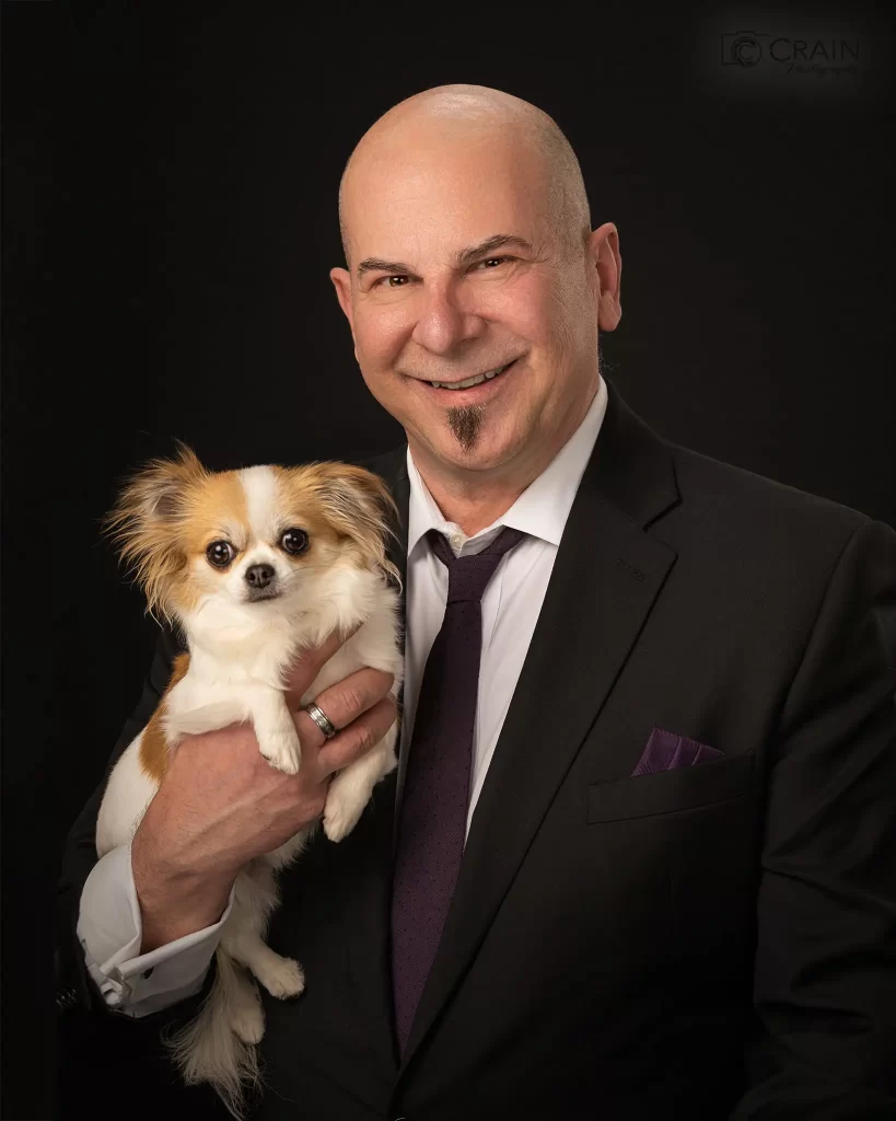 A Man holding a dog - Crafting Timeless Brand Images: Tacoma's Professional Photographer